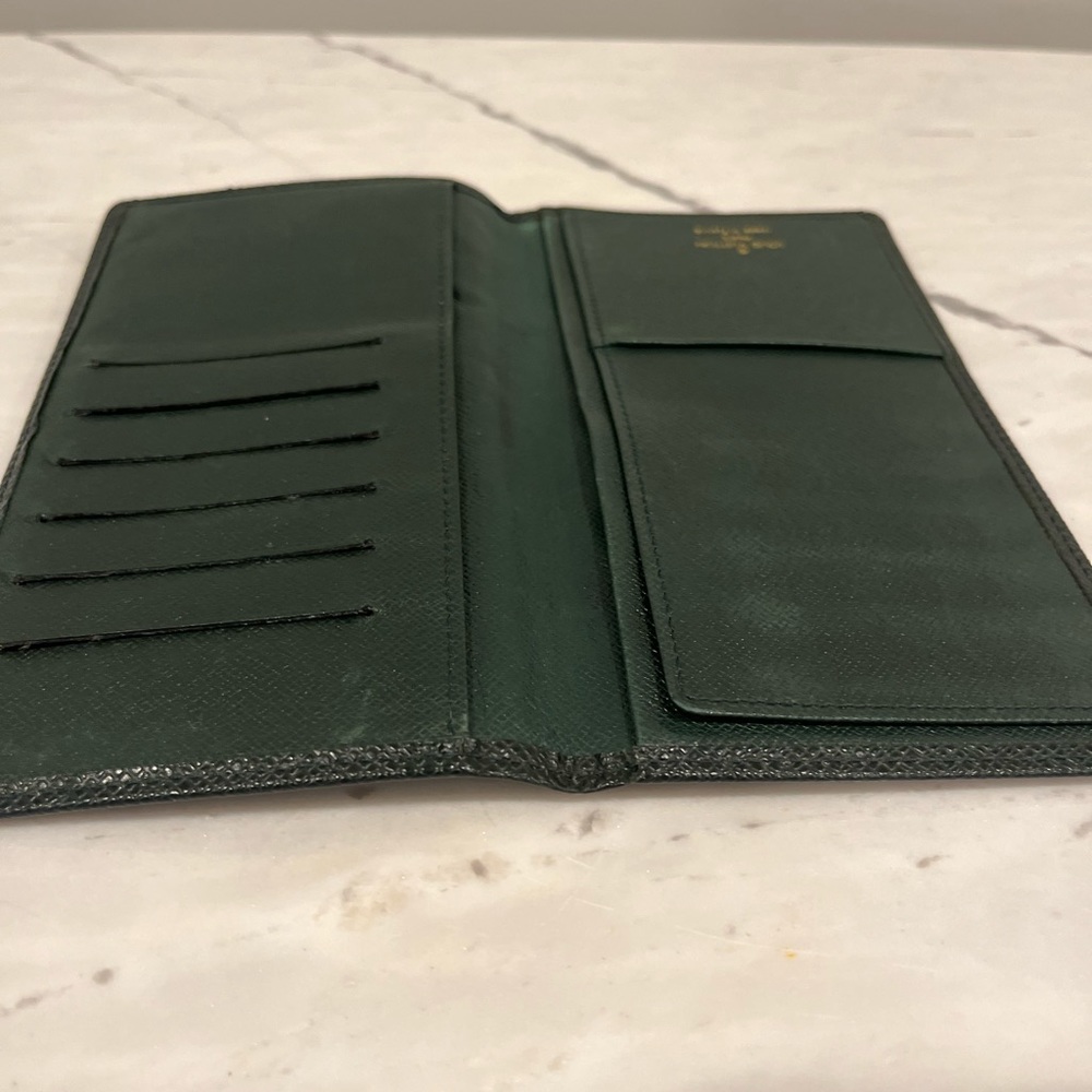 Louis Vuitton Taiga leather long wallet checkbook
